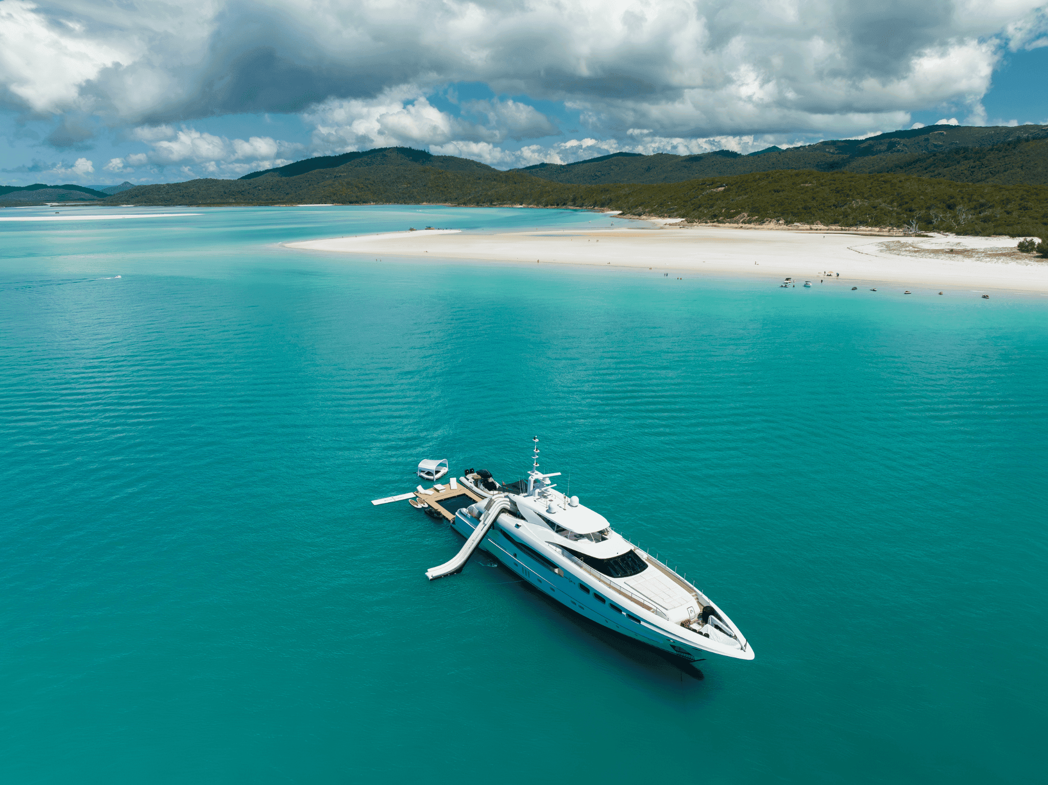 Whitehaven Beach sandbar and turquoise shallows from the air